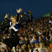 The dance team performs before fans at Lubbers Stadium